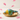 Handpainted yellow lotus floral details on Jaipur blue pottery conch shell by Aditya Blue Art Pottery